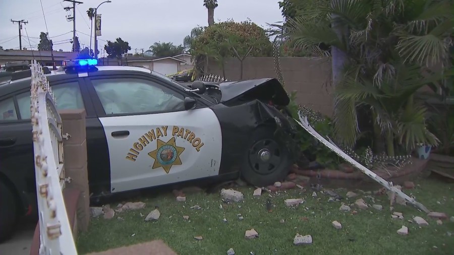 Motorcycle pursuit ends with CHP patrol cars crashing into a La Puente home on June 10, 2023. (KTLA)