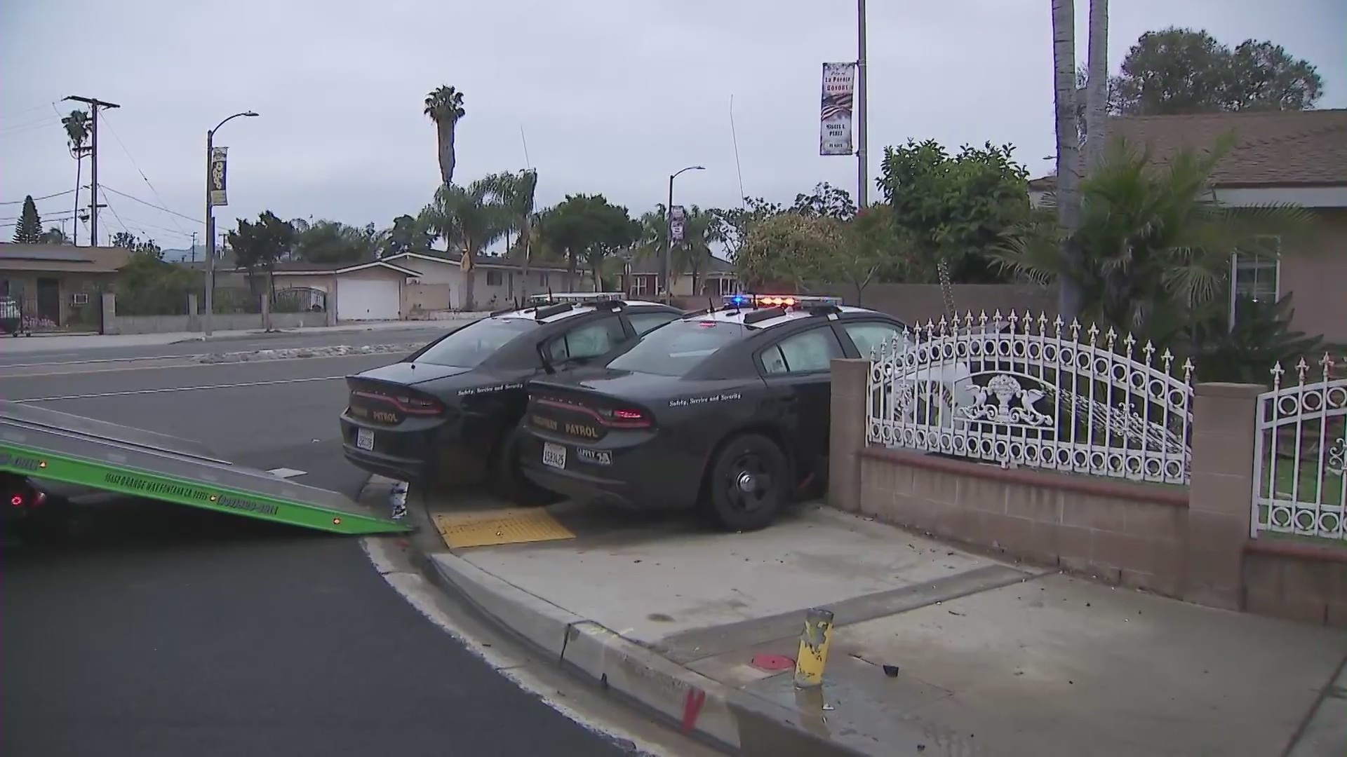 Motorcycle pursuit ends with CHP patrol cars crashing into a La Puente home on June 10, 2023. (KTLA)