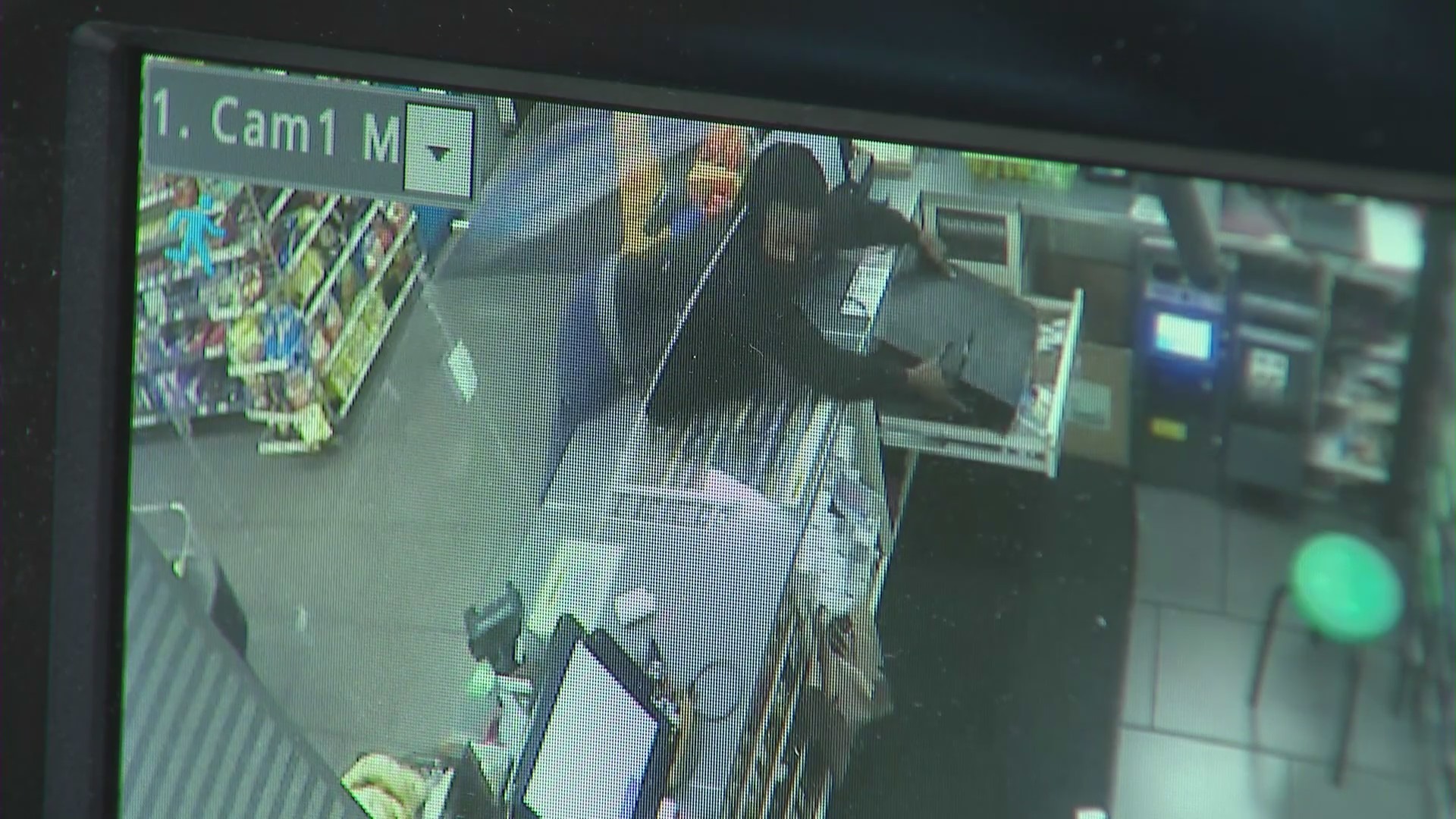 Surveillance footage captured a 7-Eleven store robbed at gunpoint by two armed suspects in East Hollywood on June 24, 2023. (7-Eleven)