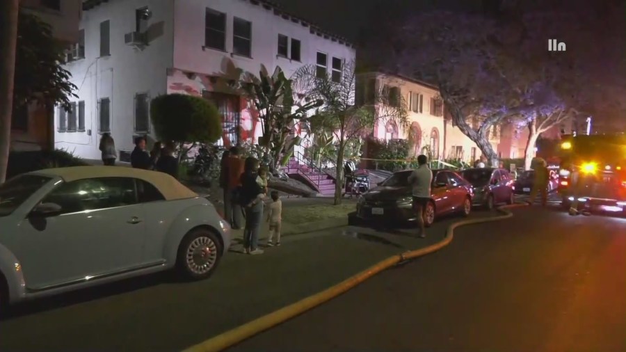 Multiple families were forced to evacuate their homes after an intense fire ripped through a parking garage and destroyed two vehicles in the Fairfax District of Los Angeles, California on June 10, 2023. (LLN)