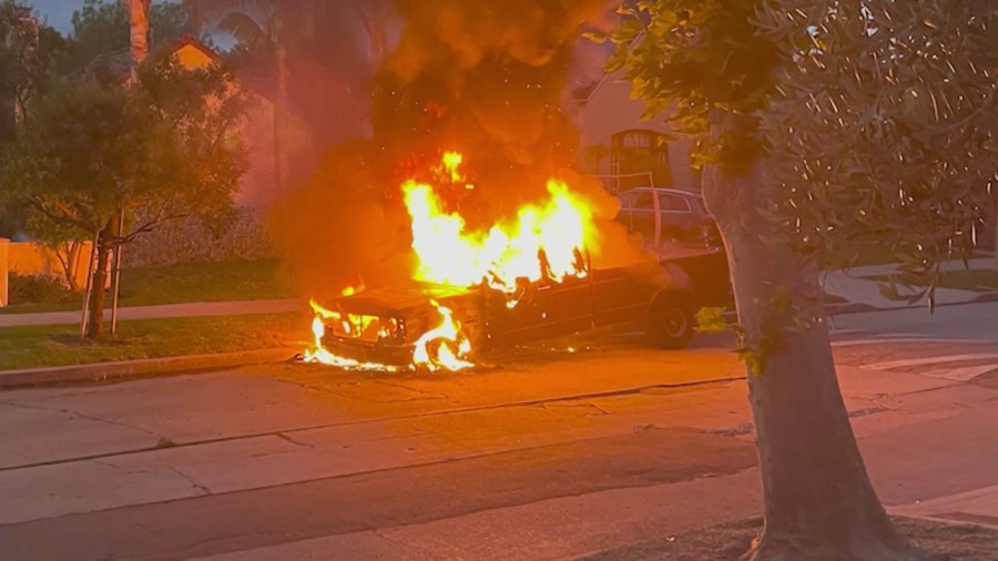 Arsonist torches classic Ford pickup truck in the Fairfax district amid a string of reported fires in the neighborhood on June 7, 2023. (KTLA)