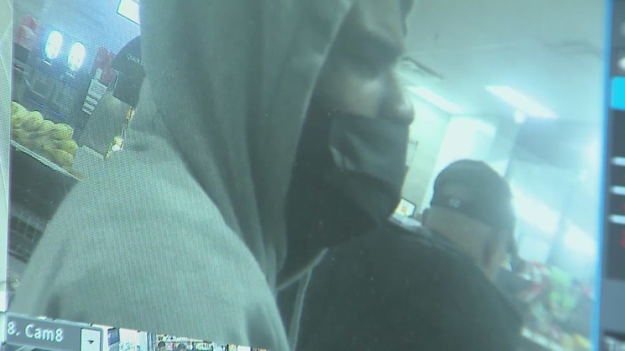 Surveillance footage captured a 7-Eleven store robbed at gunpoint by two armed suspects in East Hollywood on June 24, 2023. (7/11)