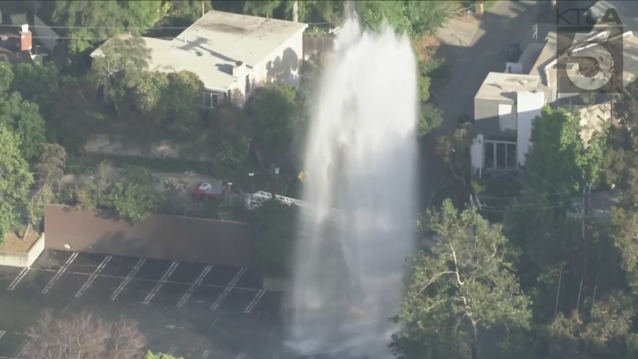 Firefighters responded to a school in Studio City flooded from a sheared hydrant leak on June 13, 2023. (KTLA)