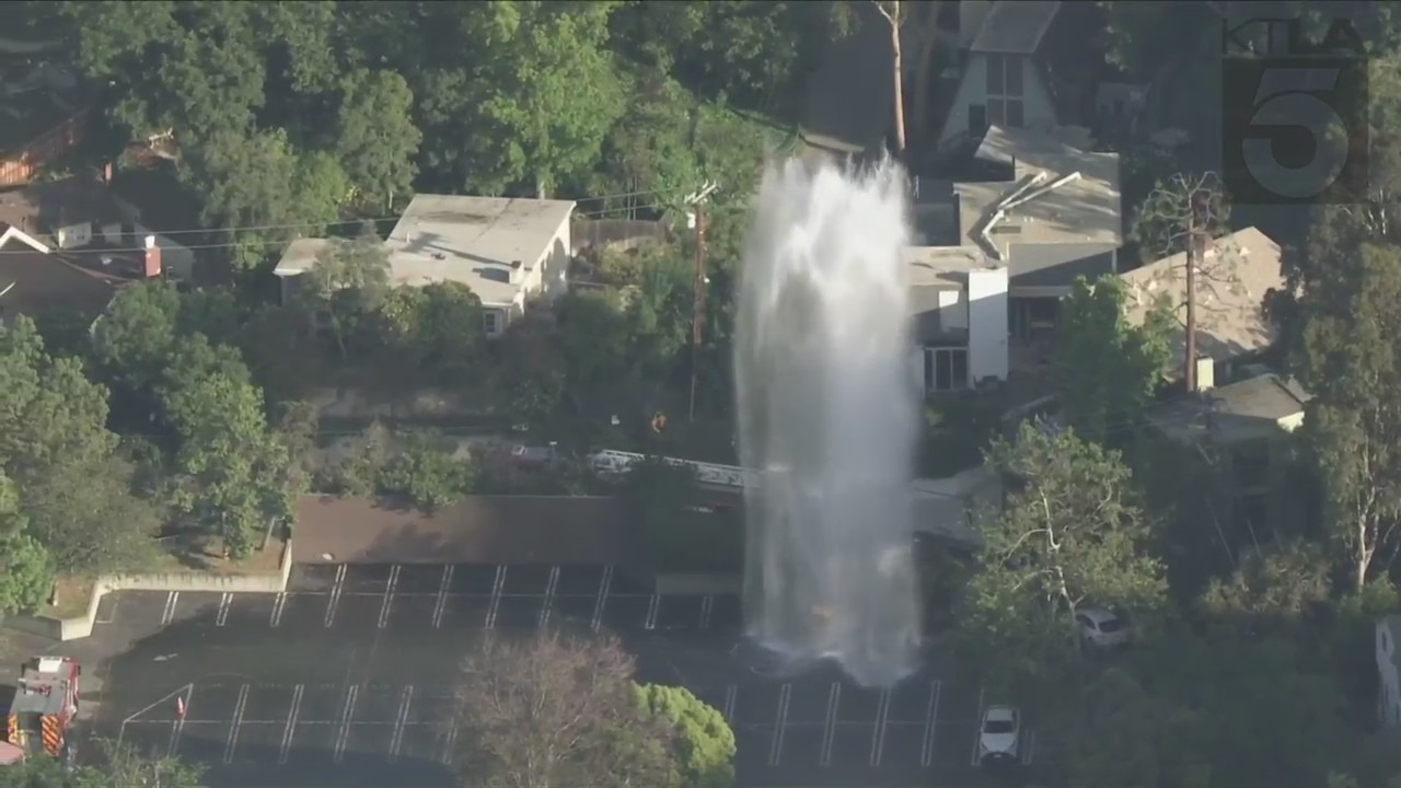 Firefighters responded to a school in Studio City flooded from a sheared hydrant leak on June 13, 2023. (KTLA)