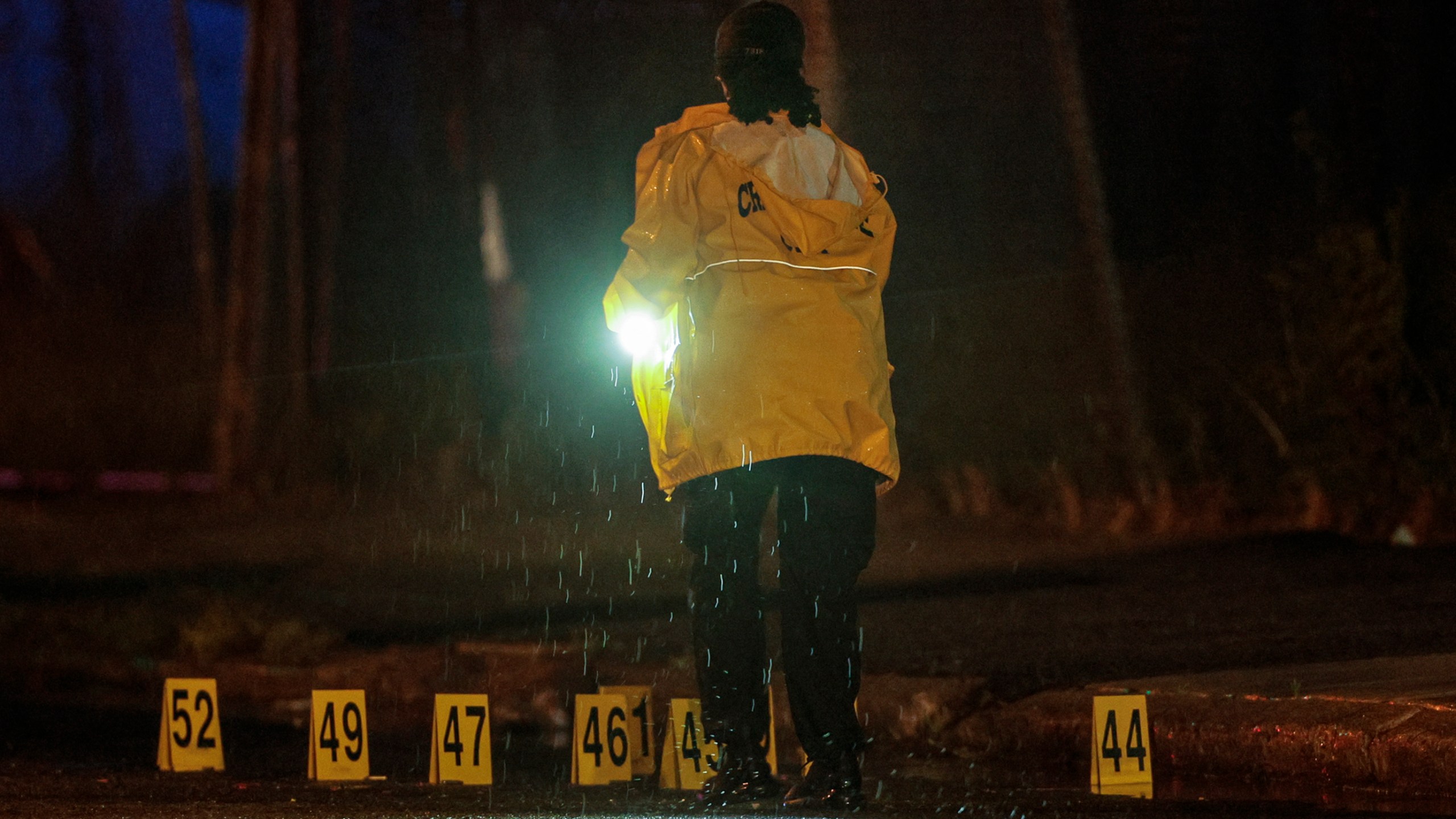 Police on the scene of a shooting Monday, July 3, 2023 in Philadelphia. Police say a gunman in a bulletproof vest has opened fire on the streets of Philadelphia, killing several people and wounding two boys before he surrendered to responding officers. (Steven M. Falk/The Philadelphia Inquirer via AP)