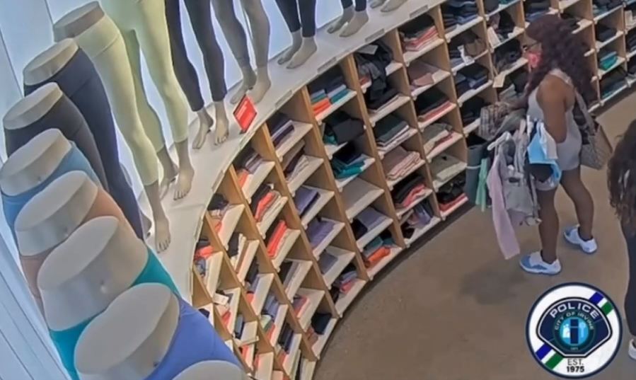 Security cameras captured a woman ransacking a Lululemon store at the Irvine Spectrum, stealing thousands of dollars worth of merchandise on July 28, 2023. (Irvine Police Department)