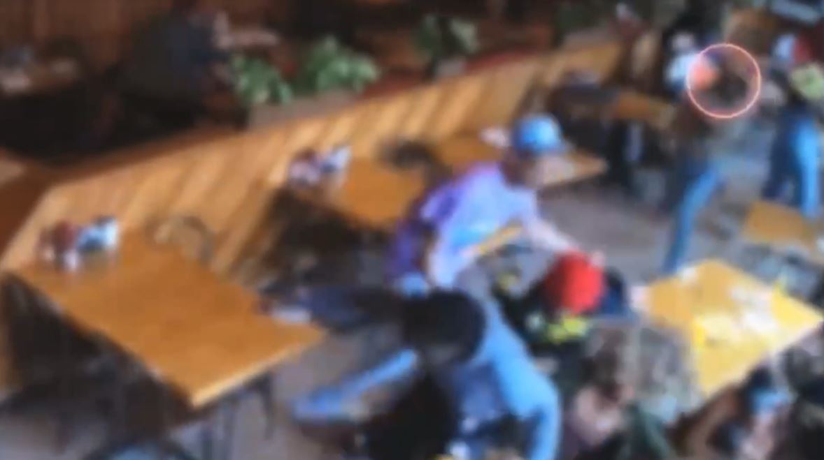 Video captured the moment a violent brawl broke out at a crowded Mid-City restaurant, sending diners scrambling for cover from an armed suspect on July 23, 2023. (Los Angeles Police Department)