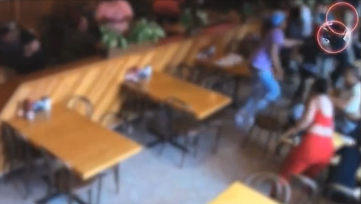 Video captured the moment a violent brawl broke out at a crowded Mid-City restaurant, sending diners scrambling for cover from an armed suspect on July 23, 2023. (Los Angeles Police Department)