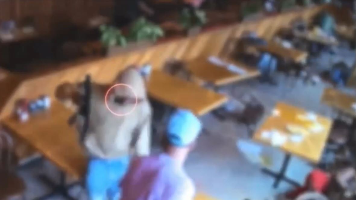 Video captured the moment a violent brawl broke out at a crowded Mid-City restaurant, sending diners scrambling for cover from an armed suspect on July 23, 2023. (Los Angeles Police Department)