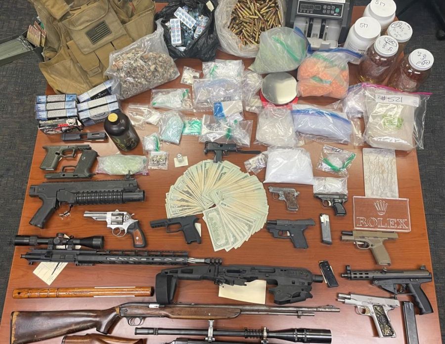 A stockpile of narcotics and stolen weapons were discovered in the home of a suspected distributor targeting Los Angeles and Ventura counties on June 28, 2023.