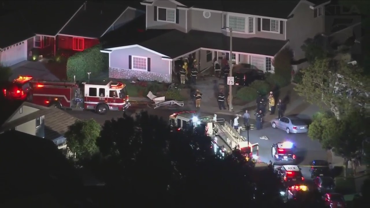 One person was hospitalized after a vehicle slammed into a Seal Beach home on July 7, 2023. (KTLA)