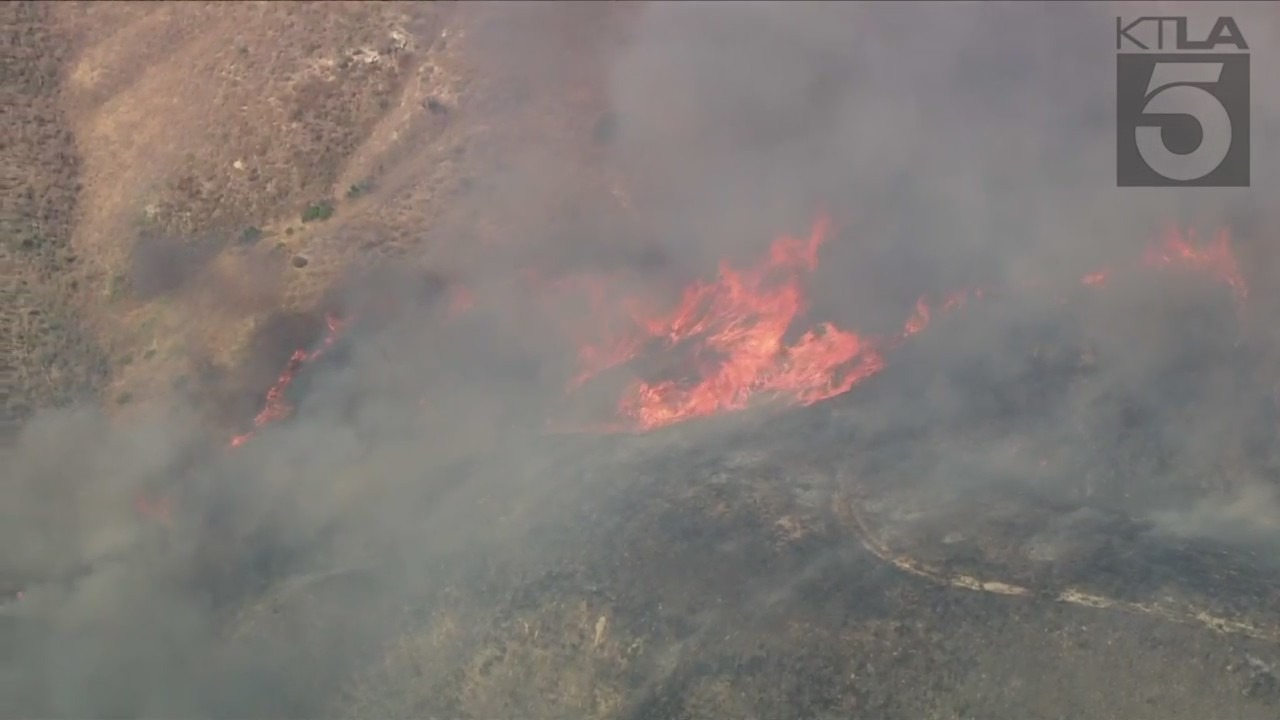 Firefighters are responding to a wildfire that erupted in Moreno Valley on July 14, 2023. (KTLA)