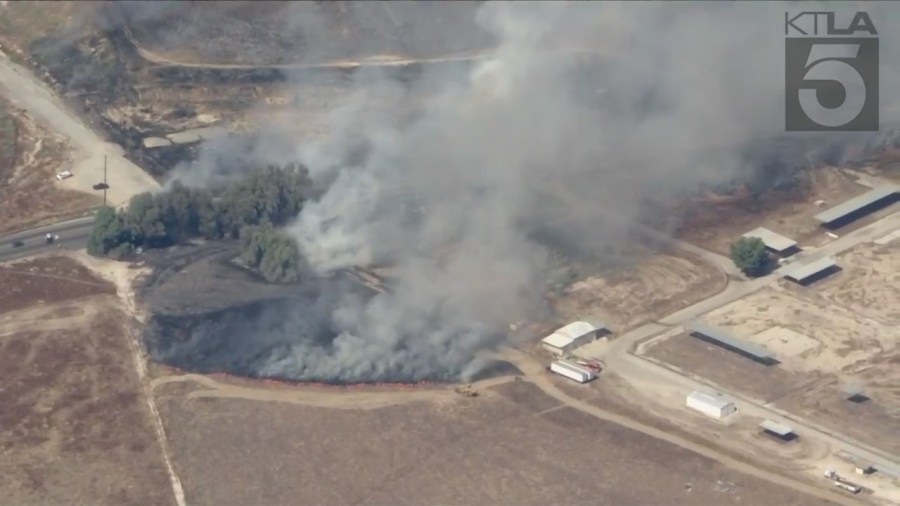 Firefighters are responding to a wildfire that erupted in Moreno Valley on July 14, 2023. (KTLA)