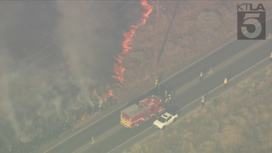 Firefighters are responding to a wildfire that erupted in Moreno Valley on July 14, 2023. (KTLA)