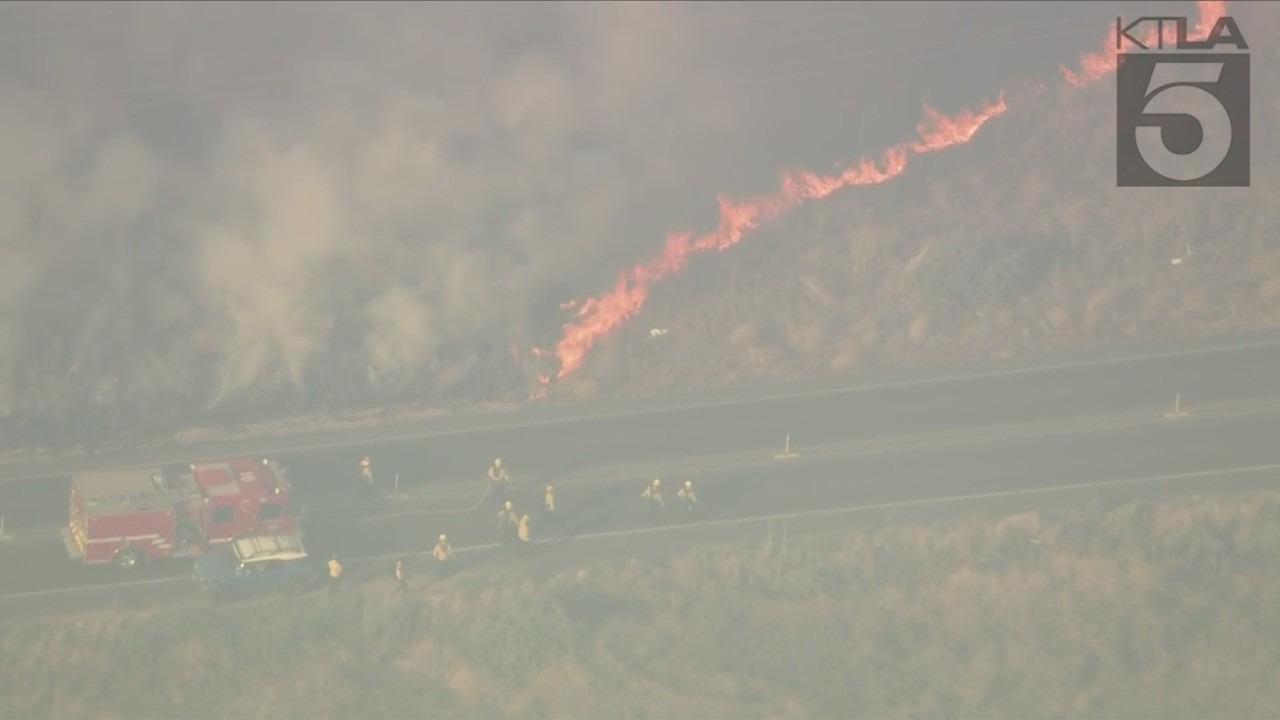 Firefighters are responding to a wildfire that erupted in Moreno Valley on July 14, 2023. (KTLA)