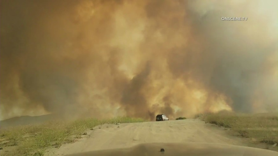 Firefighters are responding to a wildfire that erupted in Moreno Valley on July 14, 2023. (OnScene.TV)