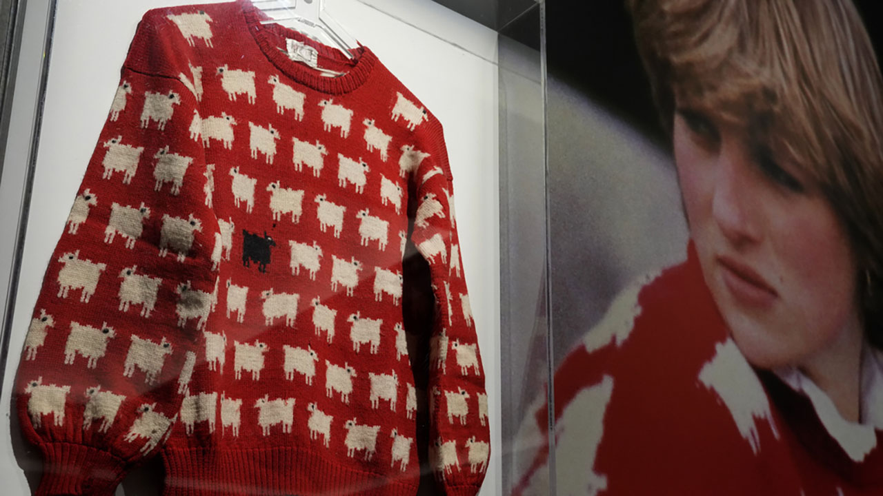 The historic Princess Diana black sheep jumper is on display at the auction house Sotheby's in London.