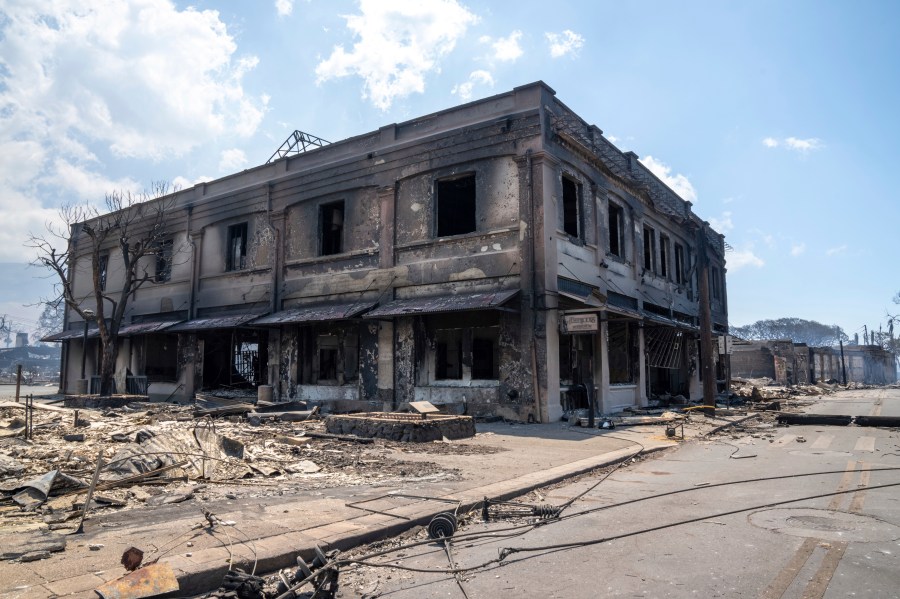 Wildfire wreckage is seen Wednesday, Aug. 9, 2023, in Lahaina, Hawaii. The scene at one of Maui's tourist hubs on Thursday looked like a wasteland, with homes and entire blocks reduced to ashes as firefighters as firefighters battled the deadliest blaze in the U.S. in recent years. (Tiffany Kidder Winn via AP)