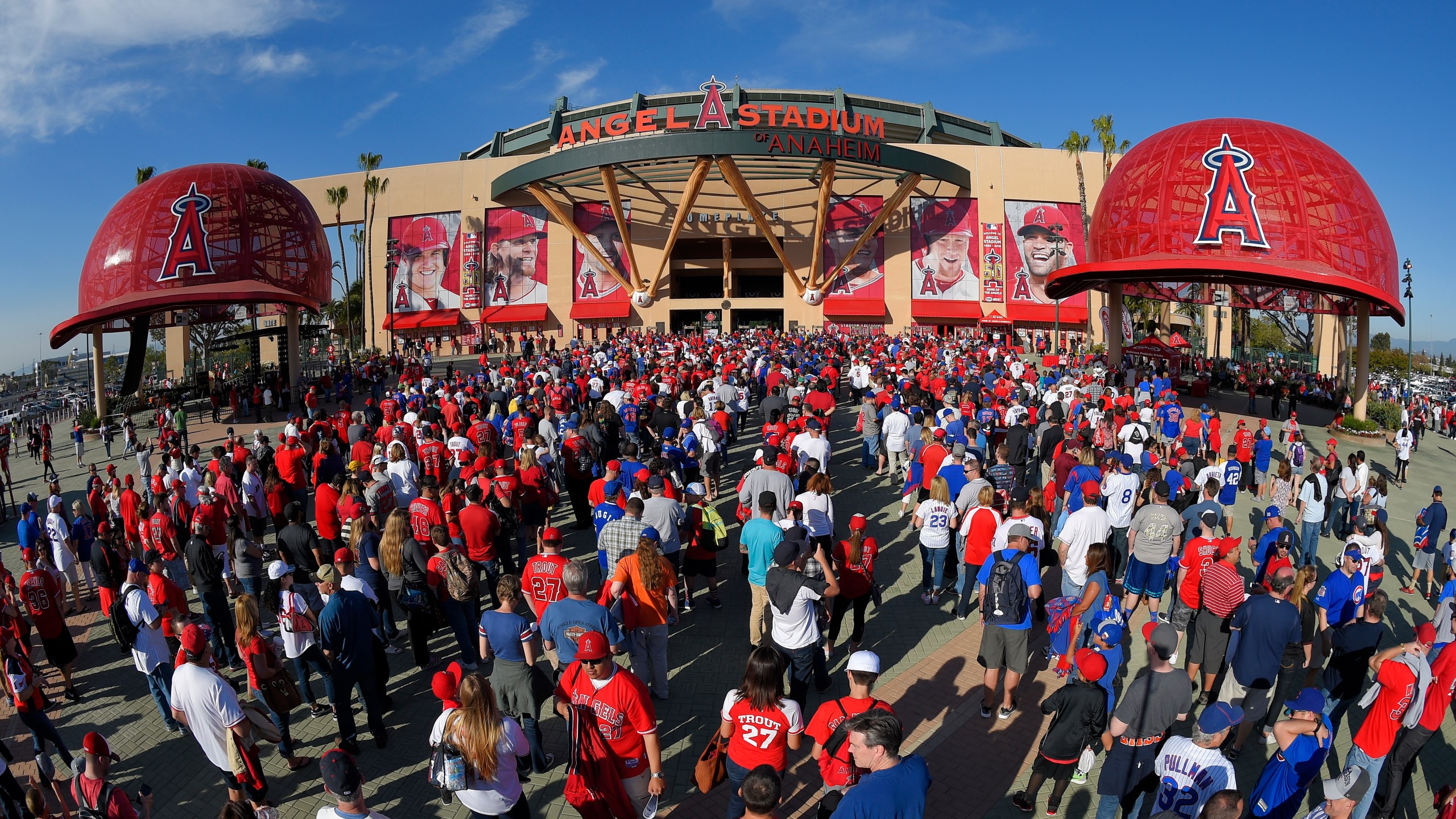 Fans line up outside Angel Stadium of Anaheim for an opening day baseball game between the Los Angeles Angels and the Chicago Cubs in Anaheim, Calif., on April 4, 2016. Harish Singh Sidhu, the former mayor of the Southern California city of Anaheim has agreed to plead guilty to obstructing an FBI corruption investigation into the $150 million sale of Angel Stadium to the owner of the Major League Baseball team, federal prosecutors announced Wednesday, Aug. 16, 2023. (AP Photo/Mark J. Terrill, File)