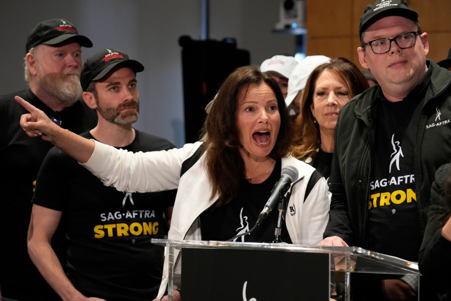 FILE - SAG-AFTRA president Fran Drescher, left, and SAG-AFTRA National Executive Director and Chief Negotiator Duncan Crabtree-Ireland speak during a press conference announcing a strike by The Screen Actors Guild-American Federation of Television and Radio Artists on July, 13, 2023, in Los Angeles. This marks the first time since 1960 that actors and writers will picket film and television productions at the same time. (AP Photo/Chris Pizzello, File)