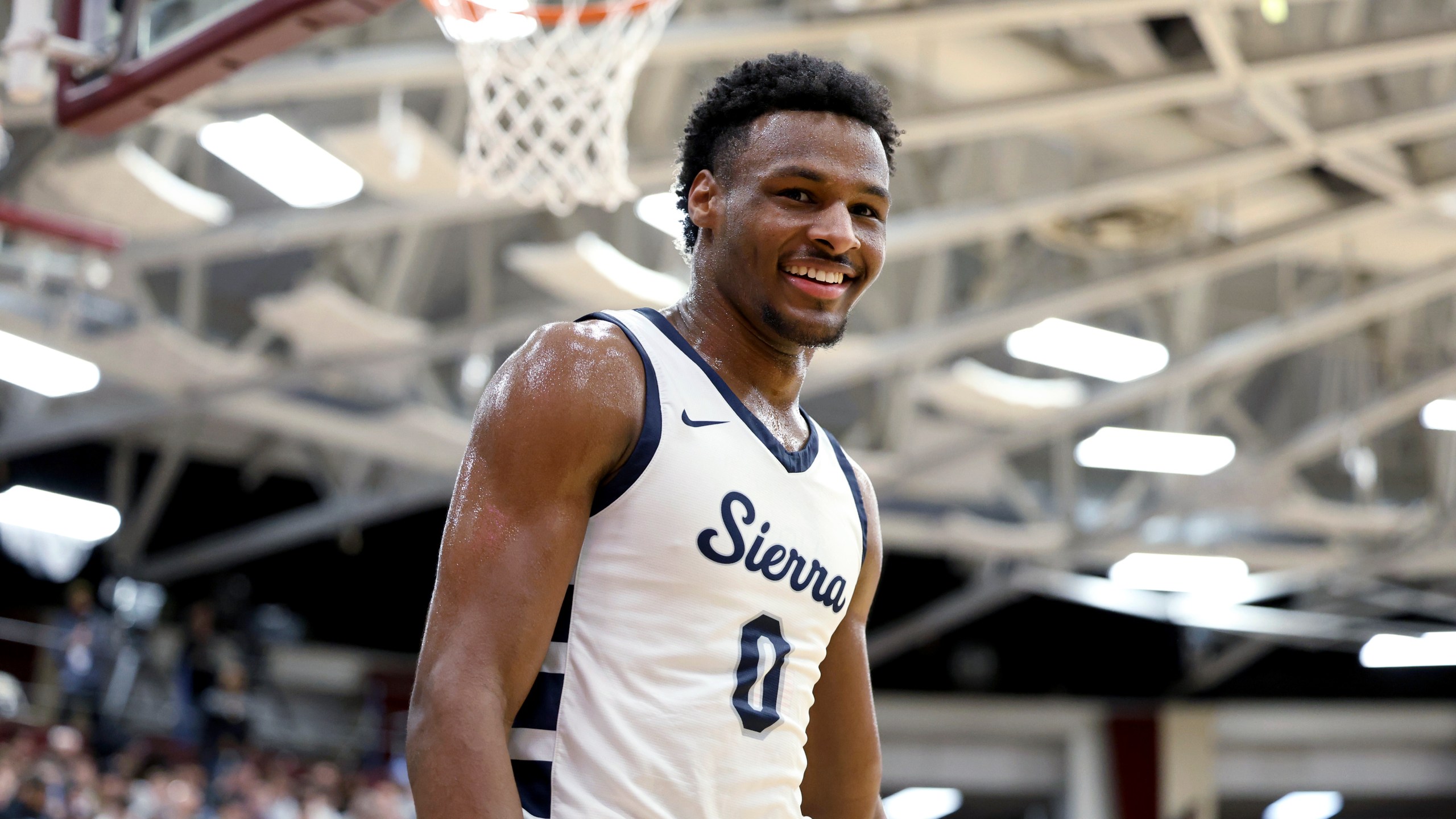 Sierra Canyon's Bronny James smiles during a high school basketball game against Christopher Columbus at the Hoophall Classic, Jan. 16, 2023, in Springfield, Mass. (Gregory Payan/Associated Press)