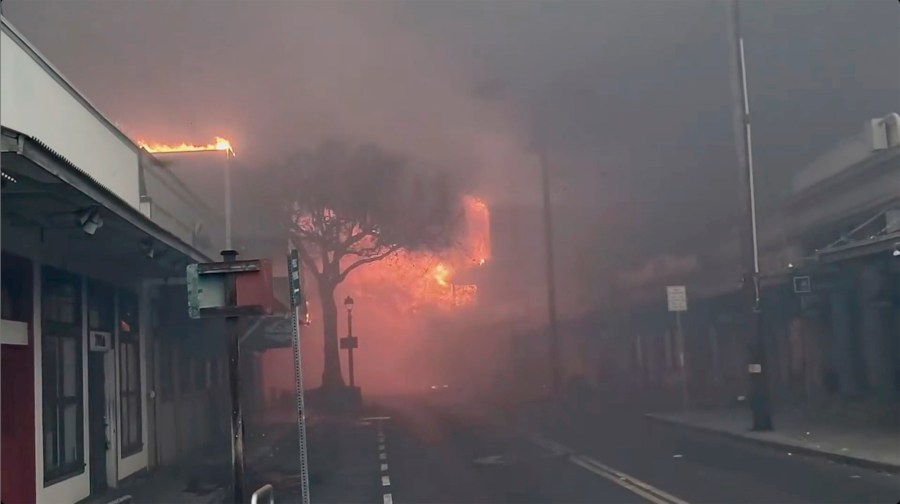 AUG. 8 - Smoke and flames fill the air from raging wildfires on Front Street in downtown Lahaina, Maui on Tuesday, Aug. 8, 2023. (Alan Dickar via AP)