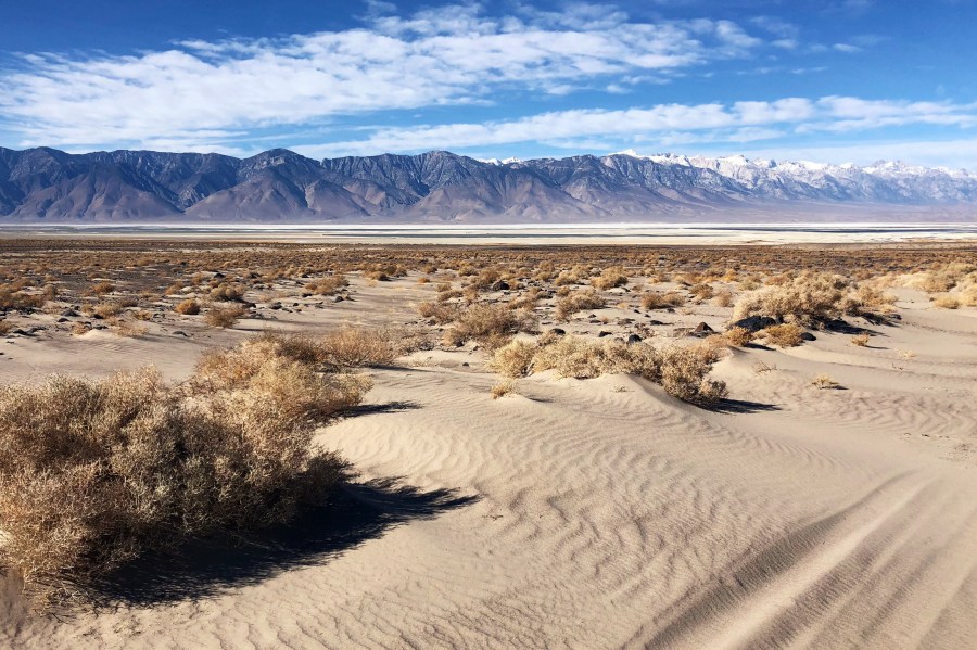 Southern California desert with sand and mountain range