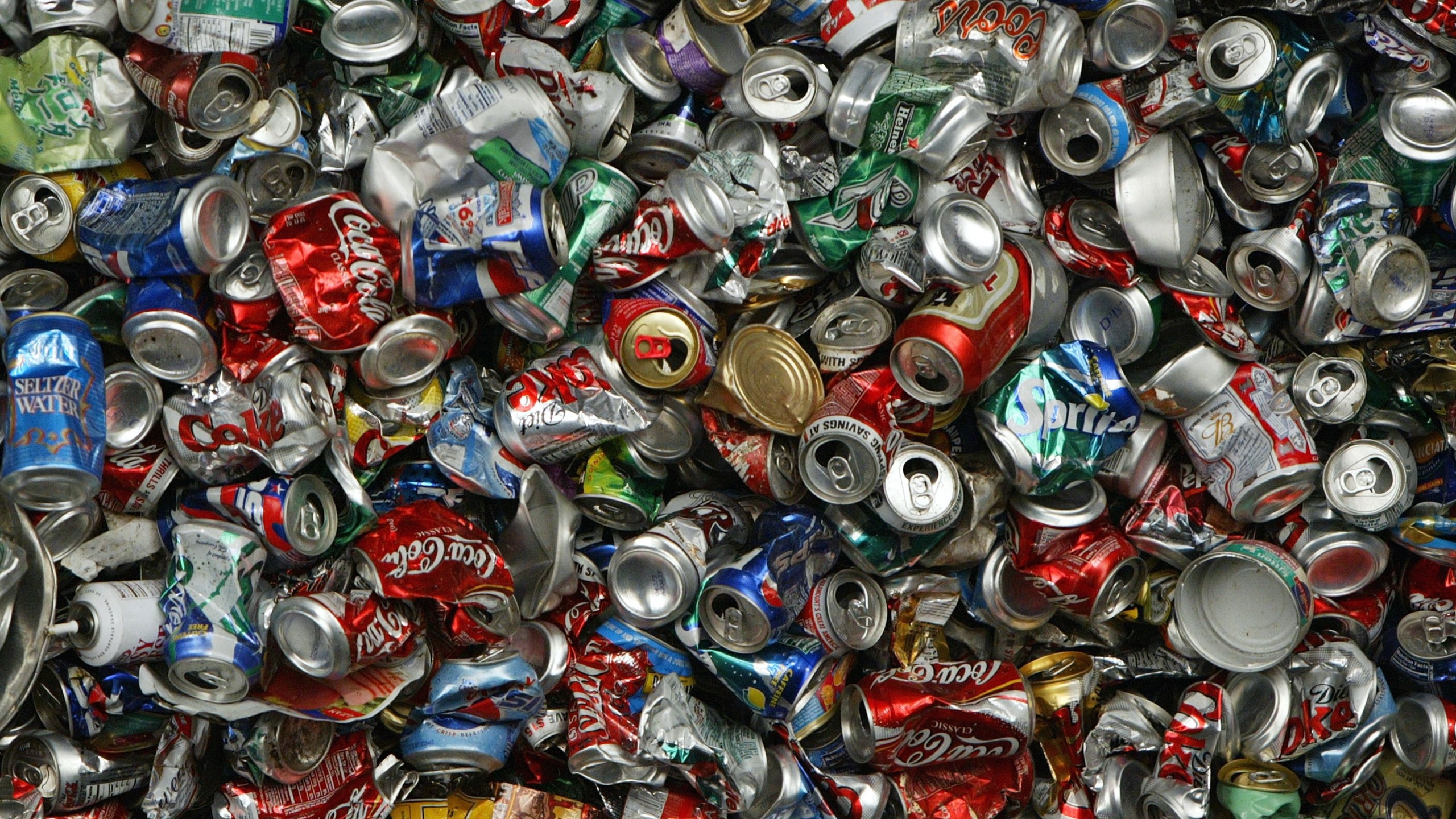 Recycled aluminum cans are seen at the Norcal Waste recycling facility July 11, 2003 in San Francisco. The most modern recycling facility in the United States opened in March of 2003 and has the ability to sort and bail up to 2,100 tons of recyclables per day using an efficient combination of specialized equipment and hand sorting. Along with paper, plastic and glass, Norcal's newly opened construction materials sorting facility can sort wood, concrete and metal. (Photo by Justin Sullivan/Getty Images)