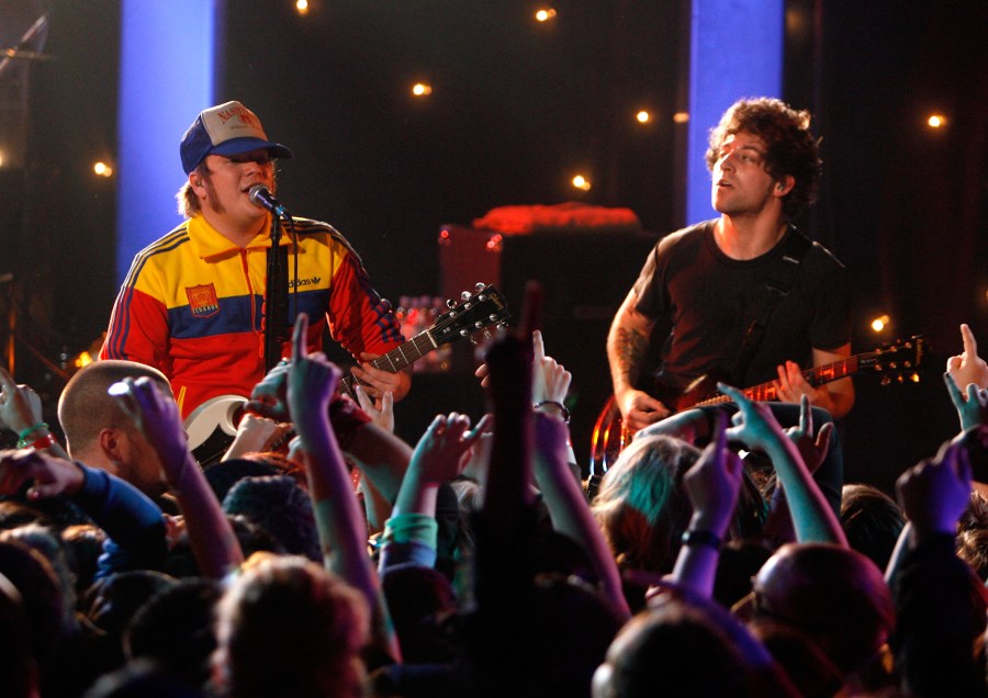 Singer Patrick Stump and guitarist Joe Trohman of Fall Out Boy perform onstage during AOL Music Live with Fall Out Boy at the Roxy Theatre on Feb. 10, 2007 in Los Angeles, California. (Kevin Winter/Getty Images for AOL Music LIVE!)