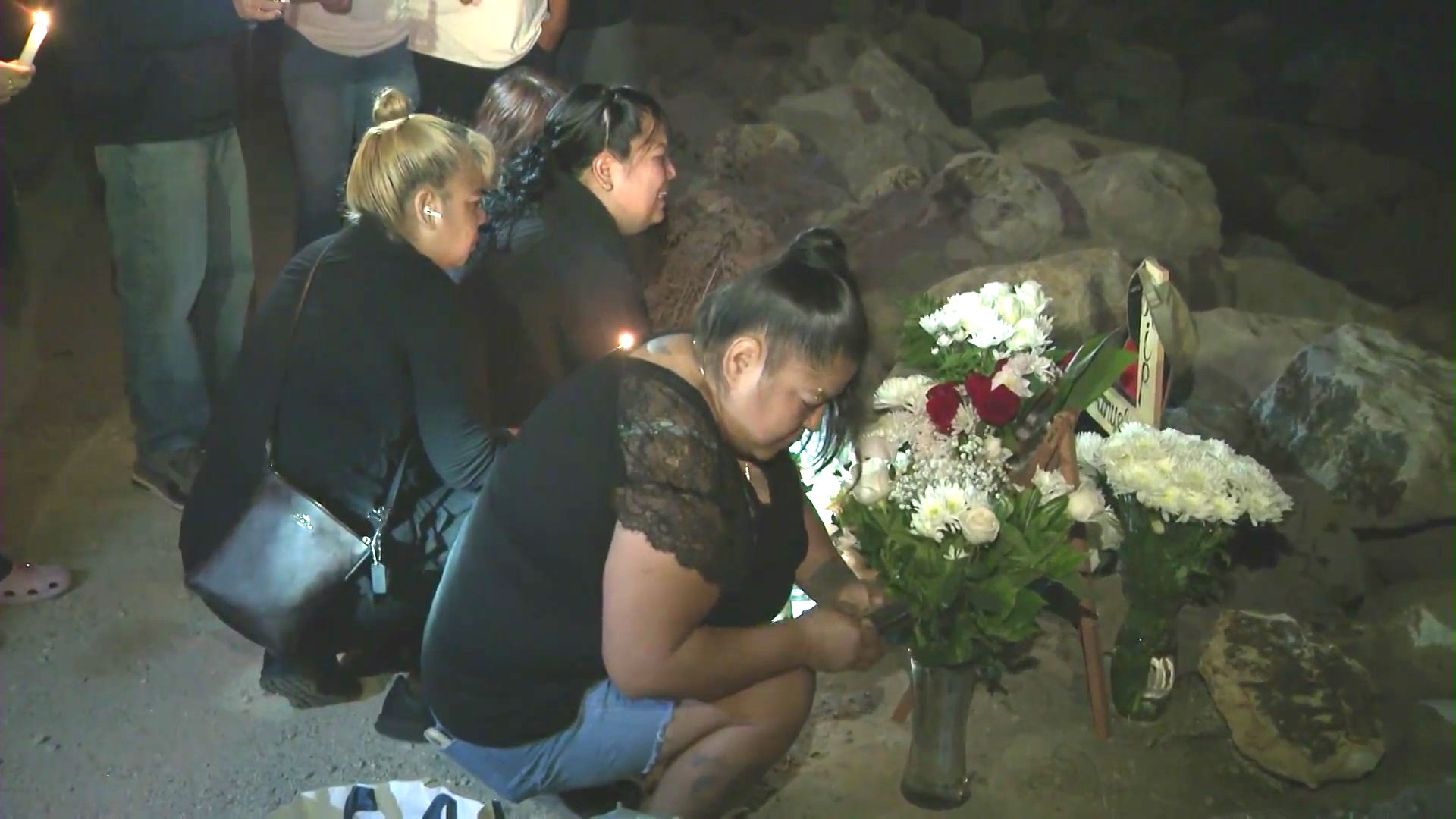 Loved ones gathered for a vigil to honor Emmanuel Baltazar Silva at Las Tunas Beach on August 31, 2023. (KTLA)