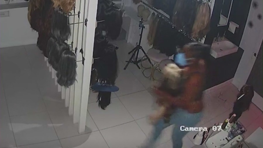 Security cameras captured burglars ransacking a Beverly Hills wig shop and escaping with almost $200,000 worth of wigs meant for cancer patients. (The Wig Fairy)