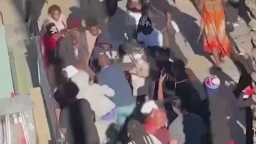 Video captured good Samaritan Maurice Hardy (in a dark blue shirt) rescuing a boy from a violent brawl at the Del Amo Fashion Center on August 29, 2023. (Maurice Hardy)