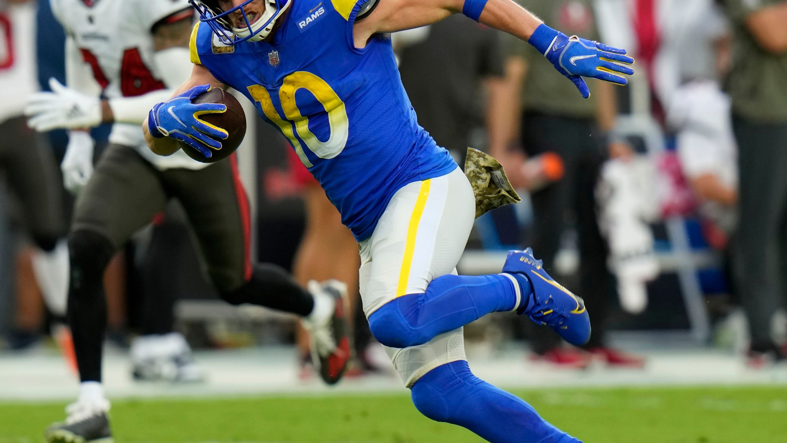 FILE - Los Angeles Rams wide receiver Cooper Kupp (10) runs to the end zone for a 69-yard touchdown reception during the first half of an NFL football game against the Tampa Bay Buccaneers, Nov. 6, 2022, in Tampa, Fla. Kupp, the 2021 Super Bowl MVP, had 75 catches for 812 yards in just nine games last year before an injury ended his season. (AP Photo/Chris O'Meara, File)