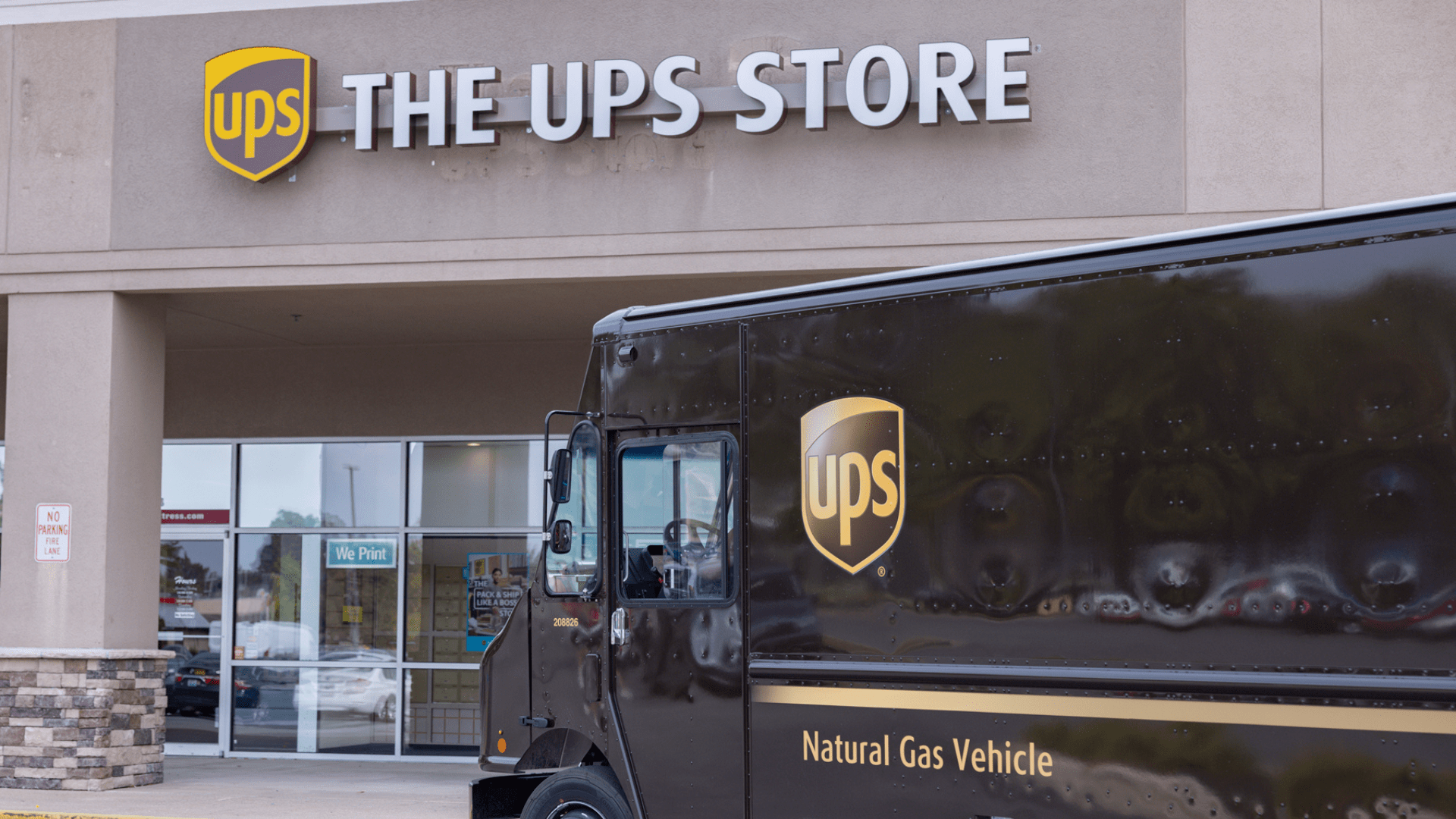 UPS delivery truck outside of a store. (United Parcel Service)