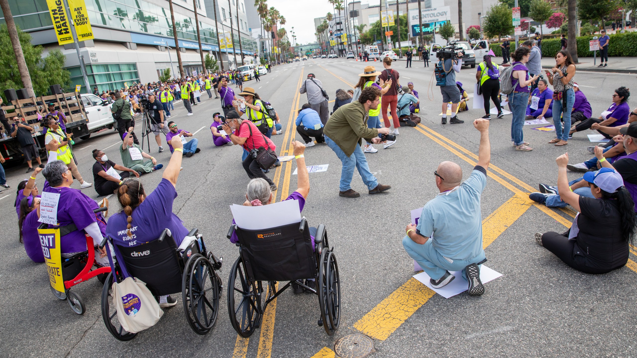 Health care workers sit in protest on a roadway in Hollywood as part of an organized demonstration against Kaiser Permanente on Sept. 4, 2023. In total, 23 were arrested and cited. (SEIU UHW)