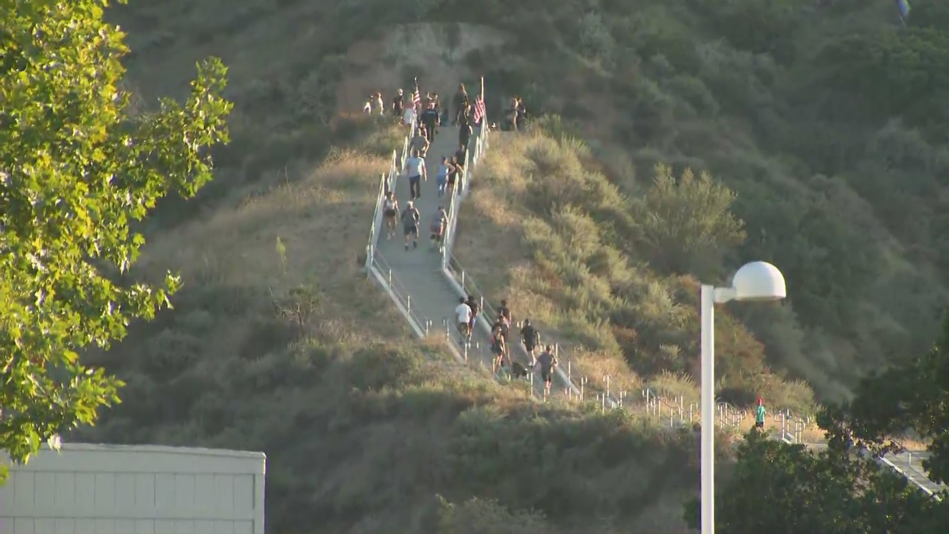 Memorial climb held for L.A. County Sheriff’s Deputy Ryan Clinkunbroomer at the Central Park stairs in Santa Clarita on Sept. 19, 2023. (KTLA)