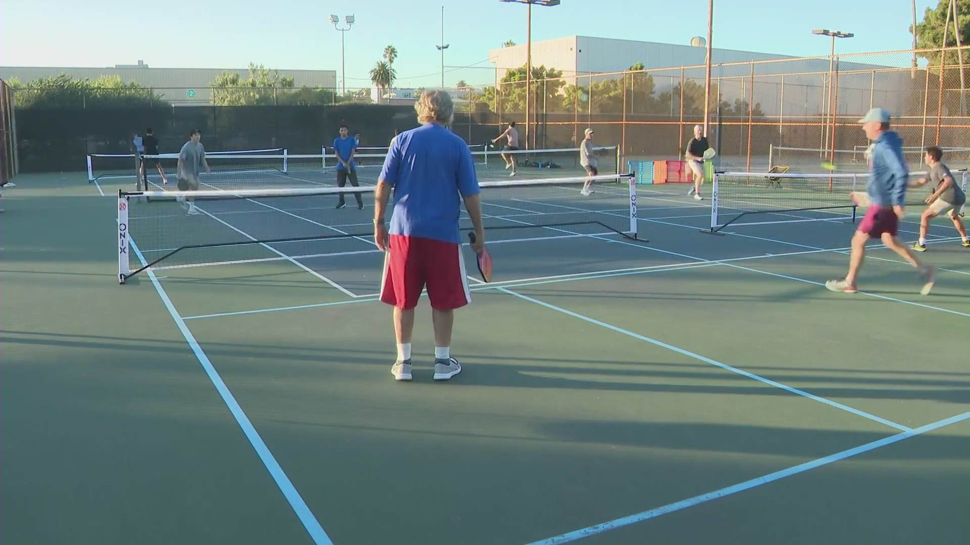 Players from the Santa Monica Pickleball Club playing pickleball at Memorial Park. (KTLA)