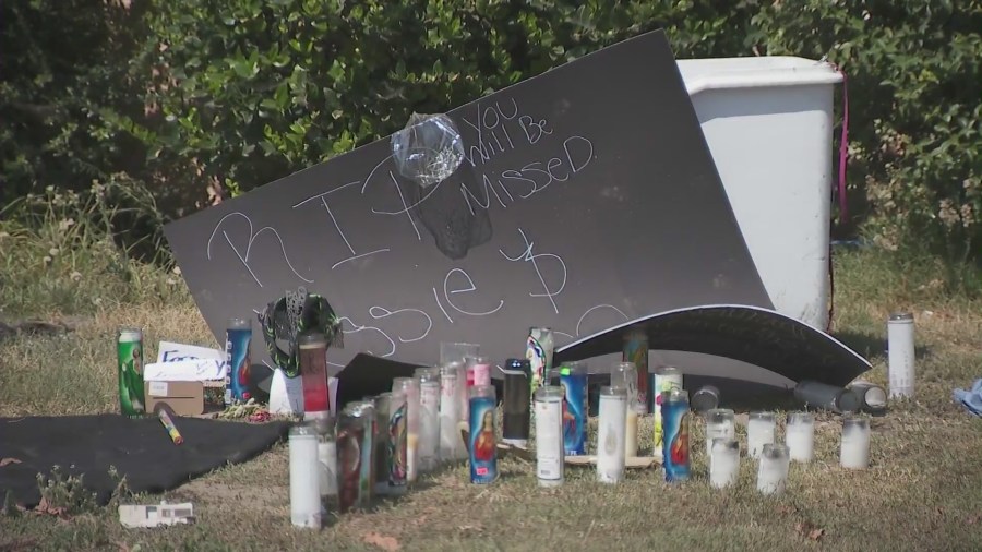 A memorial seen outside the home as loved ones grieve the loss of Alfred Murillo, Jr. and Jesse Jamal Austin. (KTLA)