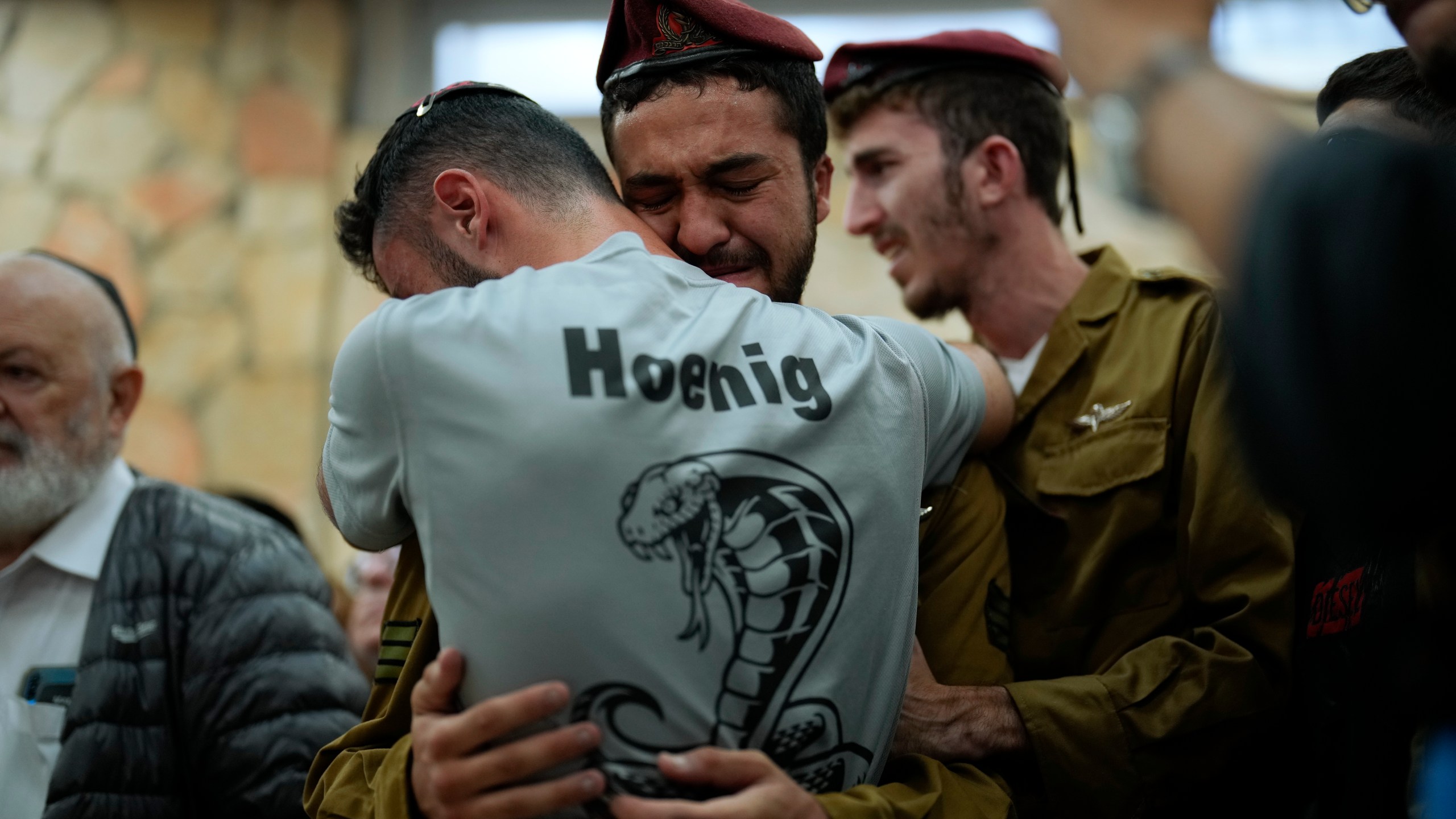 Mourners react during the funeral of Israeli soldier Benjamin Loeb, a dual Israeli-French citizen, in Jerusalem, Tuesday, Oct. 10, 2023. Loeb was killed on Saturday as the militant Hamas rulers of the Gaza Strip carried out an unprecedented, multi-front attack on Israel. (AP Photo/Francisco Seco)