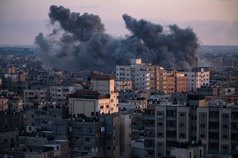 Smoke rises following an Israeli airstrike in Gaza City, Wednesday, Oct. 11, 2023. The militant Hamas rulers of the Gaza Strip carried out an unprecedented, multi-front attack on Israel at daybreak Saturday, firing thousands of rockets as dozens of Hamas fighters infiltrated the heavily fortified border in several locations, killing hundreds and taking captives. Palestinian health officials reported hundreds of deaths from Israeli airstrikes in Gaza. (AP Photo/Fatima Shbair)