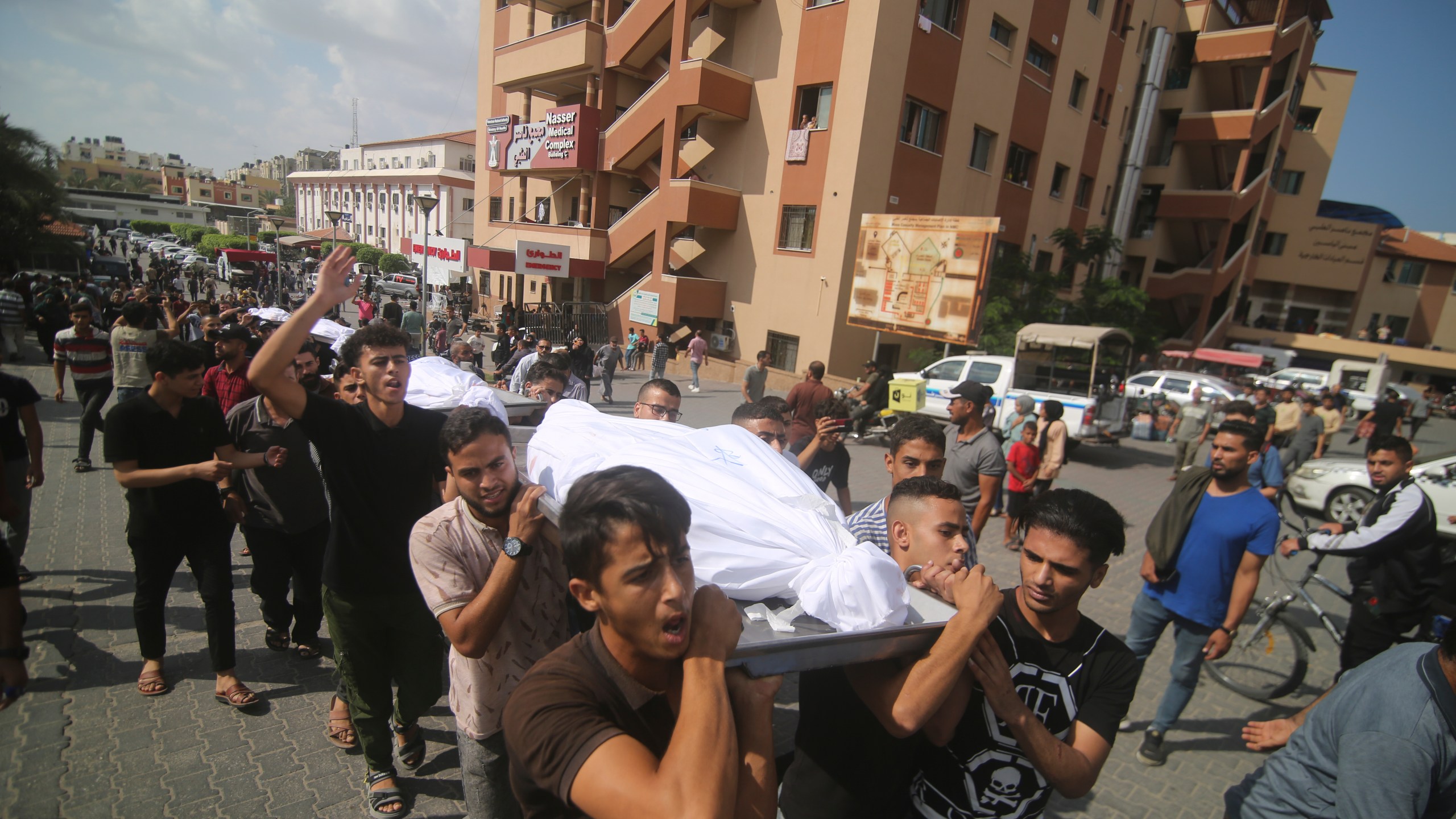 Palestinians carry bodies from the Abu Rayash family killed in Israeli shelling during their funeral in Rafah, Gaza Strip, Thursday, Oct. 12, 2023. (AP Photo/Hatem Ali)