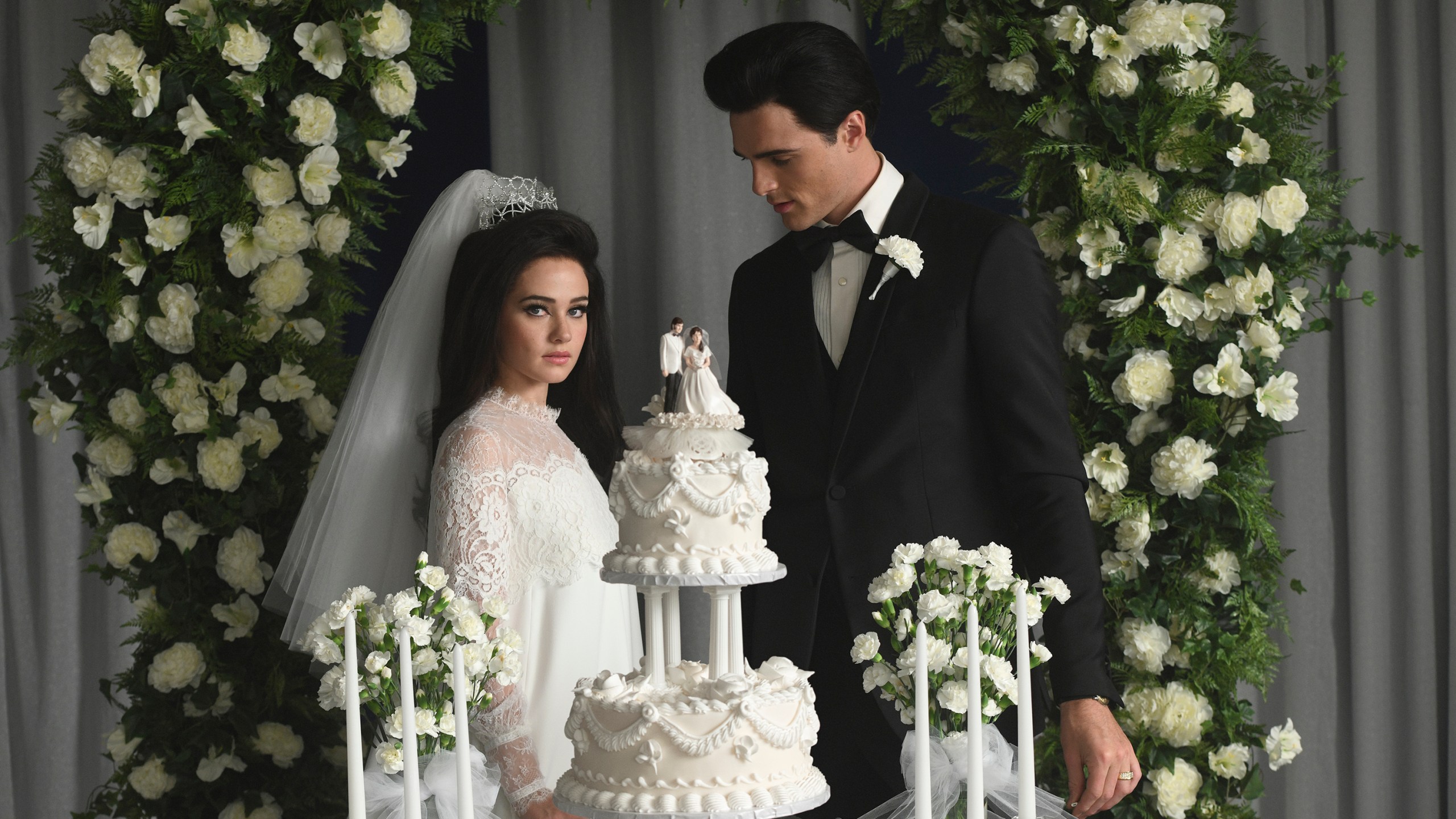 This image released by A24 shows Jacob Elordi as Elvis, right, and Cailee Spaeny as Priscilla, in a scene from "Priscilla." (Philippe Le Sourd/A24 via AP)