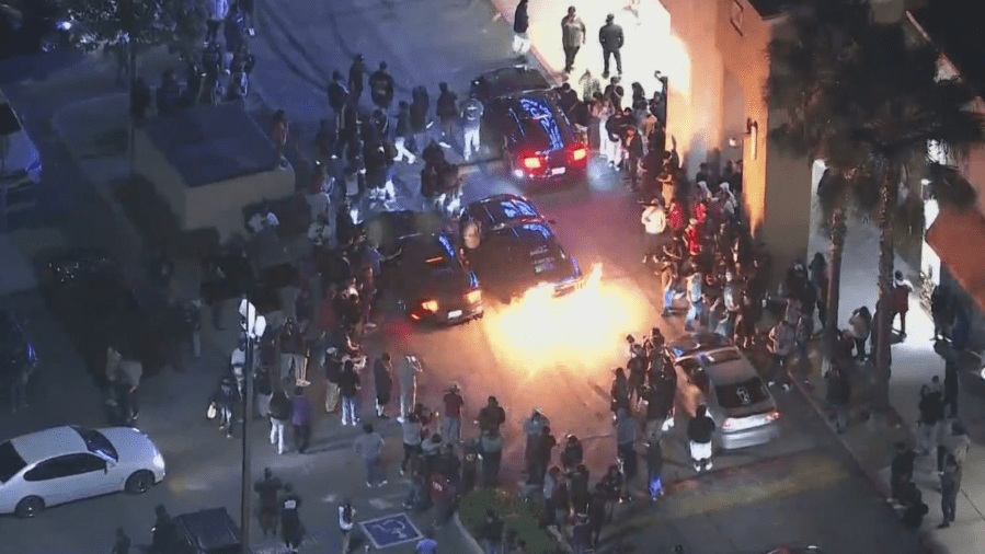 Crowd outside a Rosemead shopping center