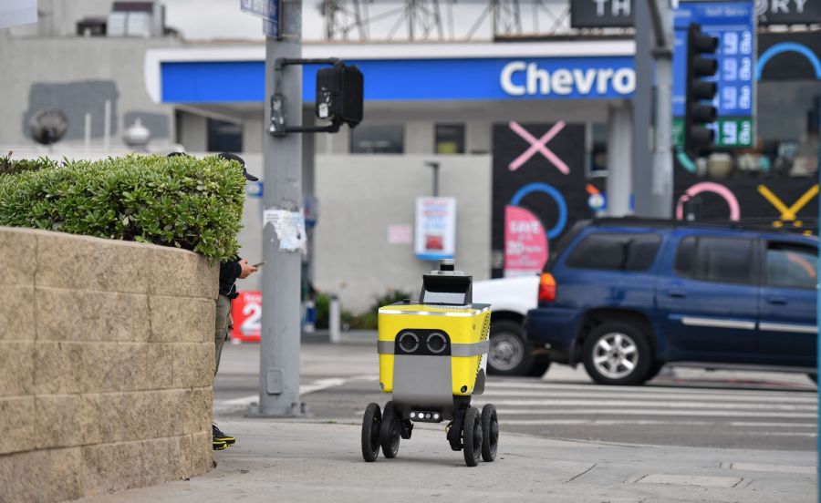 A Postmates delivery robot is seen on its route to deliver food to customers in Los Angeles on March 24, 2020. (Getty Images)