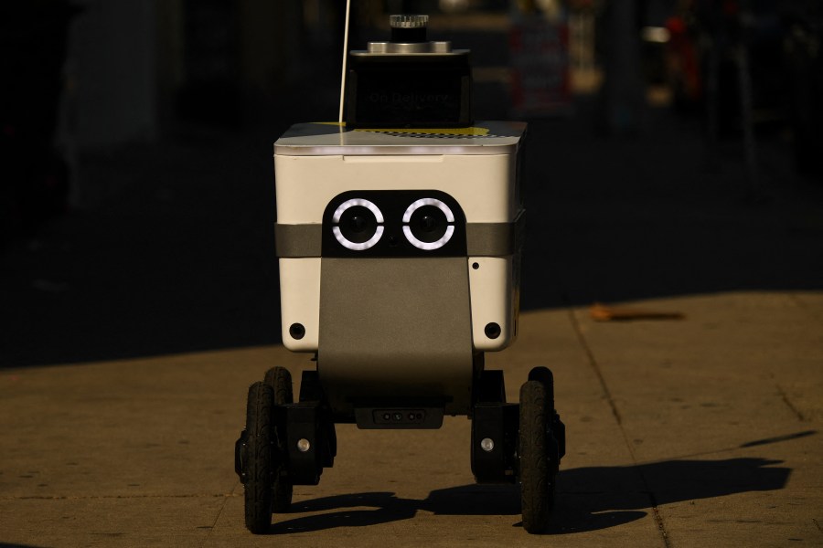 A Serve Robotics food delivery robot drives down a sidewalk along La Brea Avenue on January 25, 2022 in Los Angeles, California. (Getty Images)