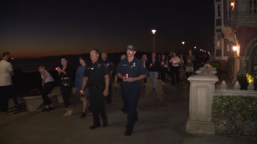 A candlelight vigil was held on Oct. 6, 2023 to honor Manhattan Beach motorcycle officer Chad Swanson who was killed in a multi-vehicle crash on the 405 Freeway in Carson. (KTLA)