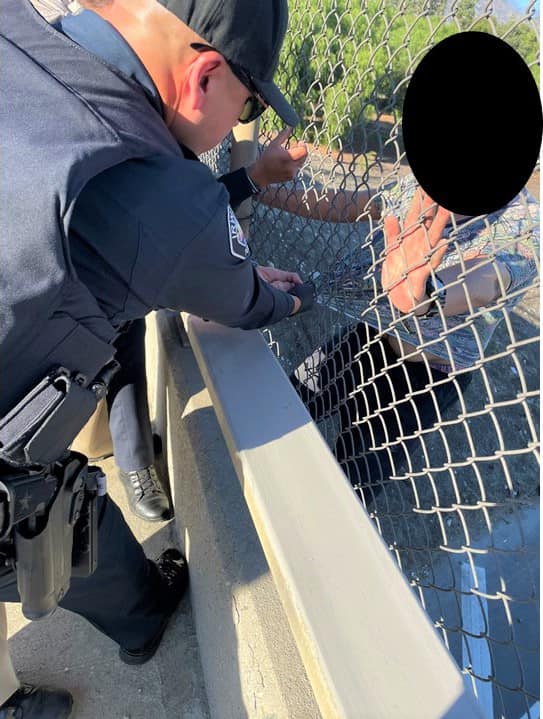 Officers rescued a man threatening to jump off an overpass on the 210 Freeway in Irwindale on Oct. 5, 2023. (Irwindale Police Department)