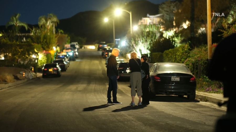 Law enforcement and loved ones arrive at Matthew Perry's Pacific Palisades home following news of the actor's death on Oct. 28, 2023. (TNLA)