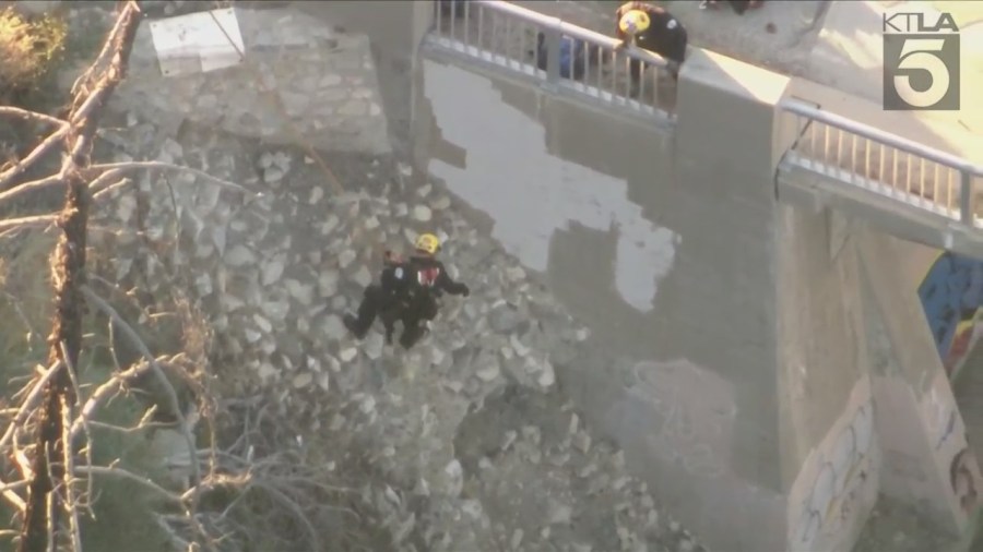 A trapped driver was rescued by crews after crashing off the side of a bridge in the Angeles National Forest on Oct. 6, 2023. (KTLA)