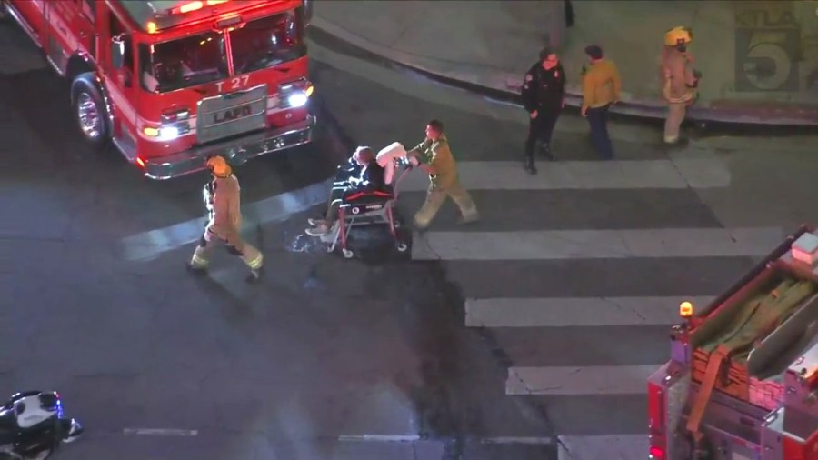 At least one person is hospitalized after a three-vehicle collision sent a truck crashing through a pizza shop in Hollywood on Oct. 31, 2023. (KTLA)